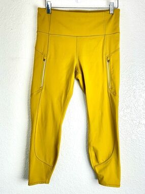 Athleta Size M/P rainier reflective performance leggings bright yellow